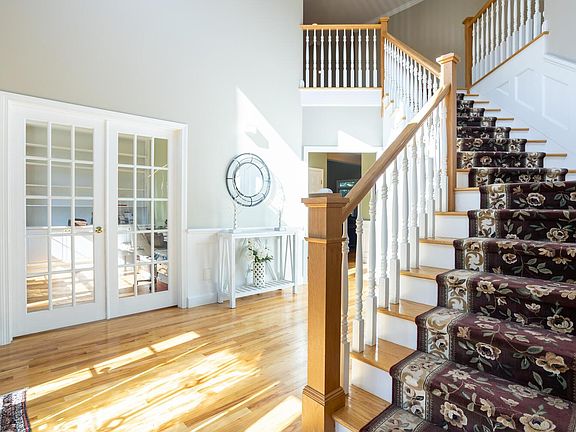 Spacious 2 story foyer with grand staircase