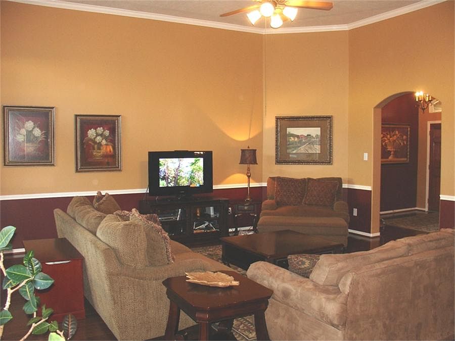 VIEW OF LARGE DEN / FAMILY ROOM (ALSO WOOD FLOORING)
