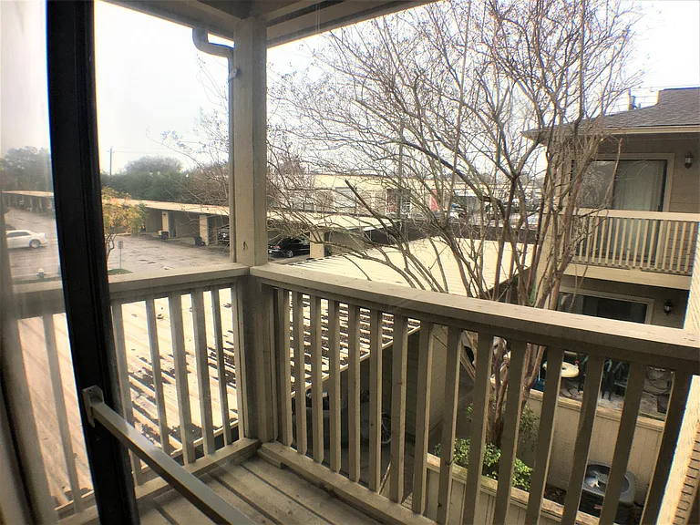Second-floor balcony overlooking the community