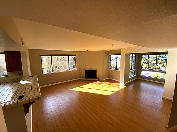 Kitchen, Living Room w Fireplace & Dining Nook