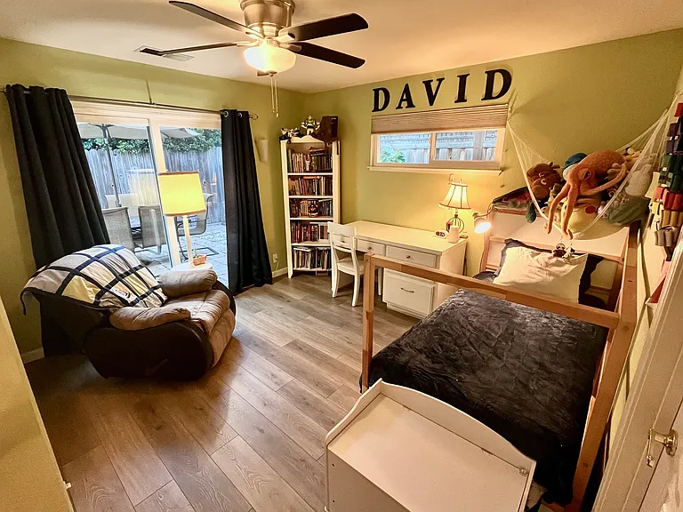Bedroom 3 with backyard access.