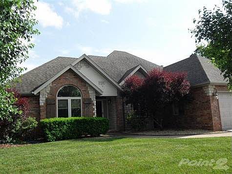 Beautiful brick home with lake view.