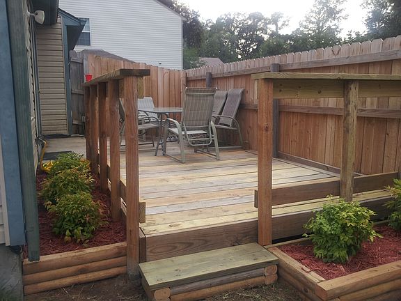 Deck off of family room. Leads out to fenced in gated yard.