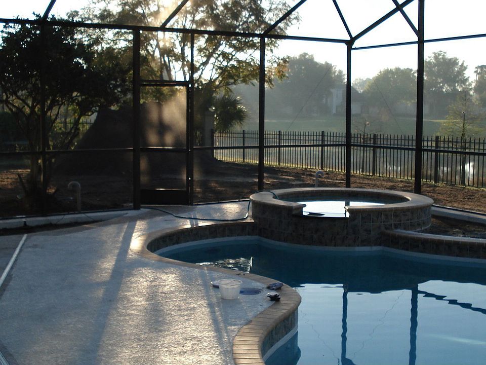 New in ground pool with screened enclosure