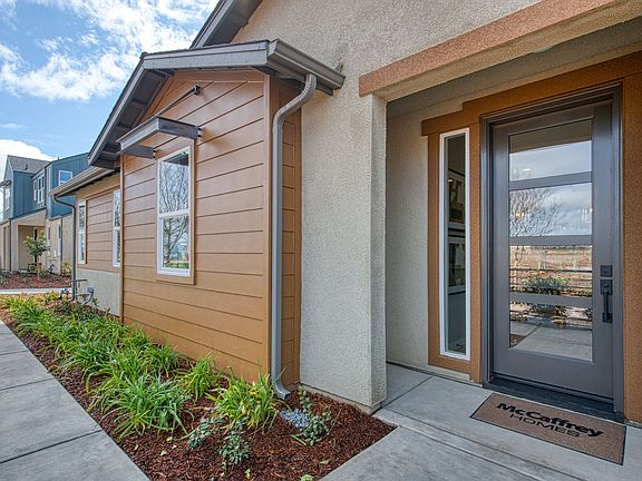 Contemporary Ranch style with siding, metal awning opportunity for upgraded entry door