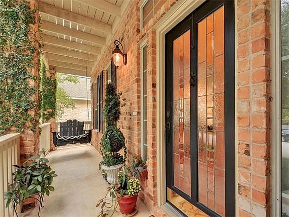 Large front porch for you to relax on or to display your plants