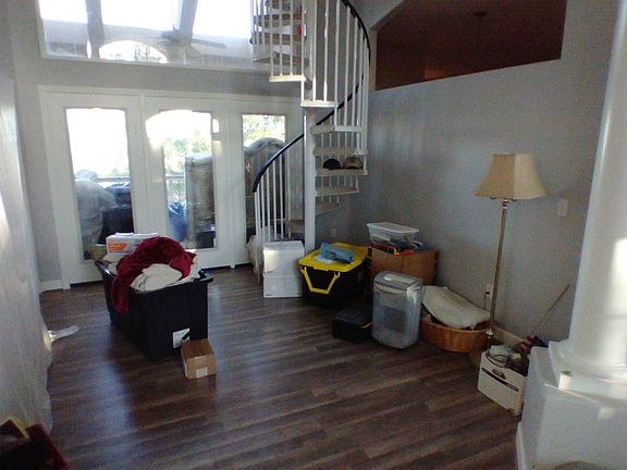 Living Room w/ spiral stairs