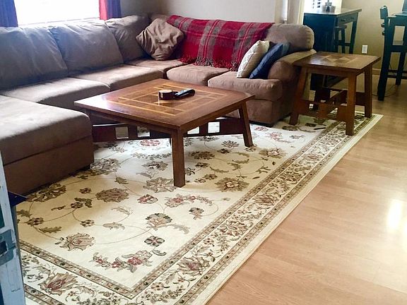 Large, open living room easily fits an over-sized sectional