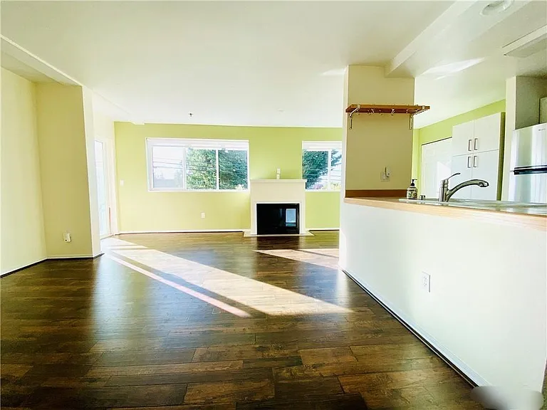 Facing west toward living room and fireplace.