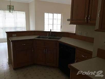 Kitchen with double stainless steel sinks