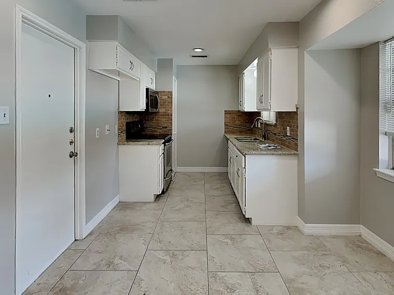 Spacious kitchen with neutral