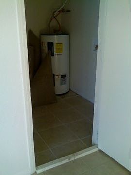 Laundry Room with 1 year old Hot water Heater