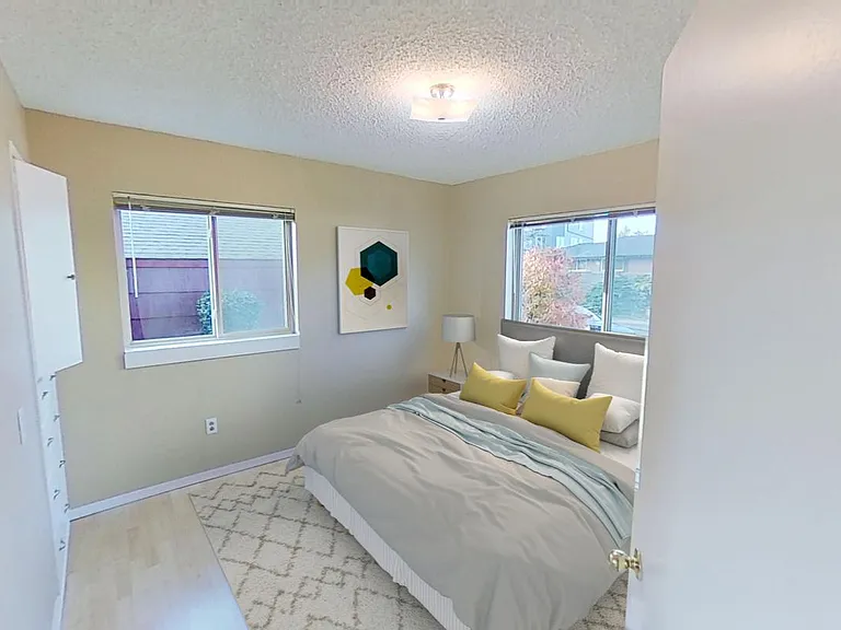 Bedroom 5. This image shows a virtually furnished space. Bedrooms come unfurnished.