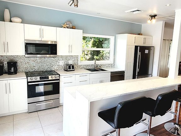 Well stocked open plan kitchen