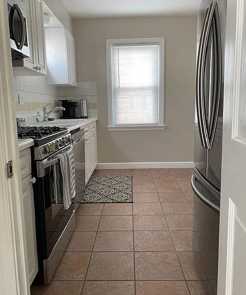 7703 Winchester Ave — Photo 10
