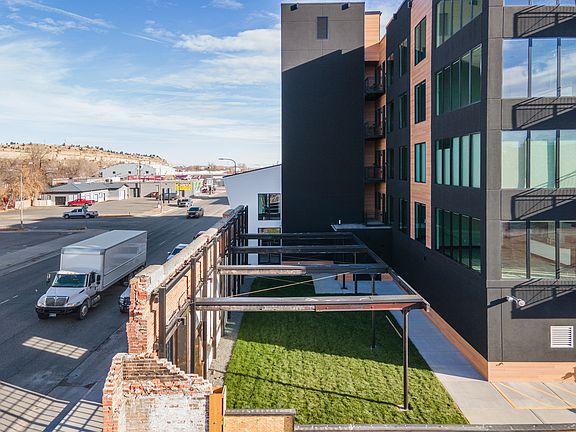 Side of building and pet park view