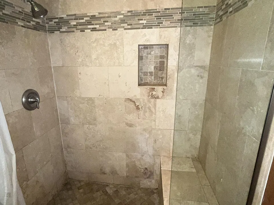 huge walk in shower, with a bench!