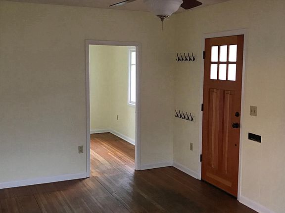 Front entry and adjacent bedroom