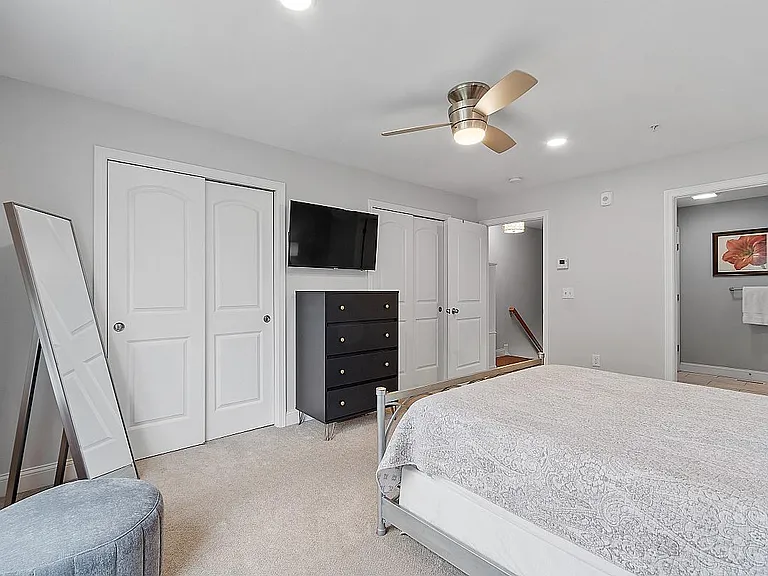 Master Bedroom View to Hallway and Bathroom. 2 Large Closets