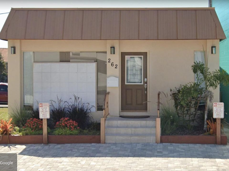 Front of Condo and two parking spaces.