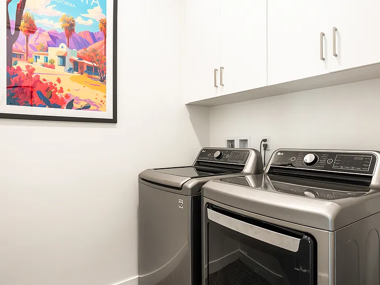 Fully equipped laundry room.