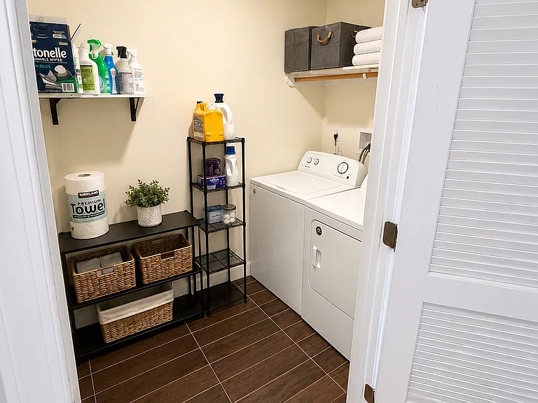 Spacious laundry room in unit
