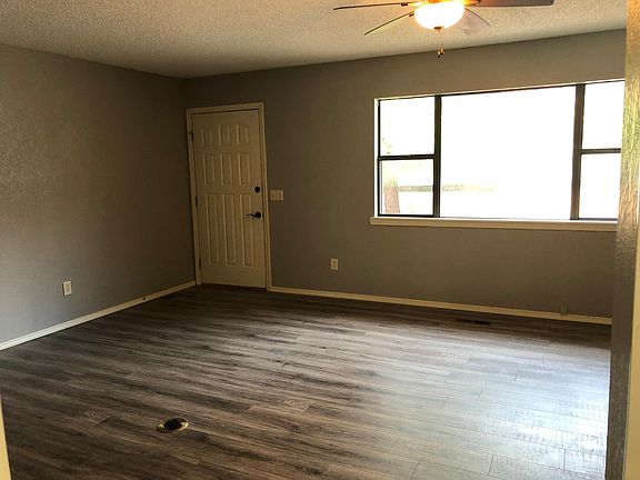 Nice laminate wood floors in living room