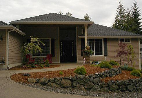 Front Exterior showing Elegant Entry, Deep Covered Porch