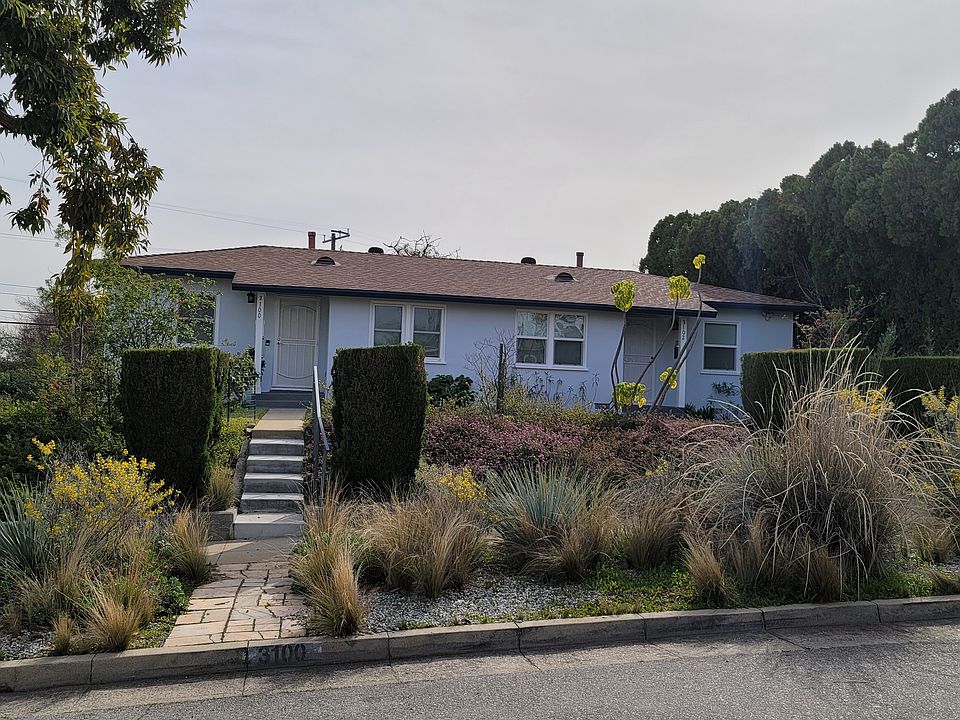 3100 Norwich is on the left side of duplex. Stairs lead to 3100 unit. It is a corner lot.