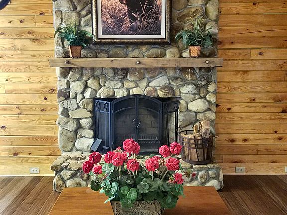 stone wood burning fireplace