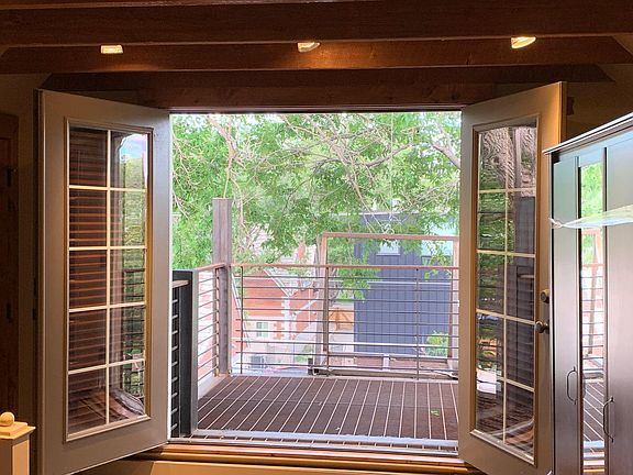 French doors leading to east facing deck.