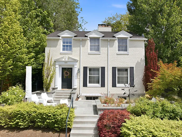Front of the home on private hilltop in prestigious "Harvard-Yale" neighborhood.