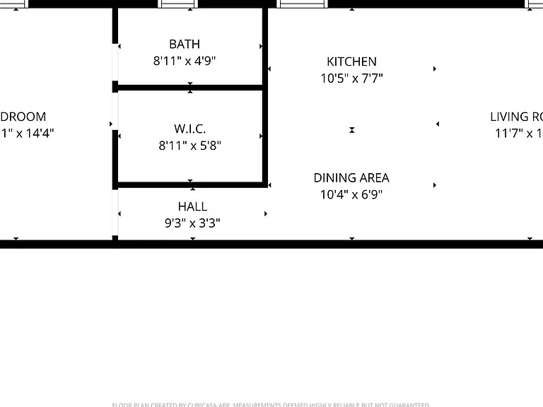 This floor plan features a spacious layout with a large bedroom, a living room, a kitchen, a dining area, a bath, and a walk-in closet. The areas are well-distributed for comfortable living.