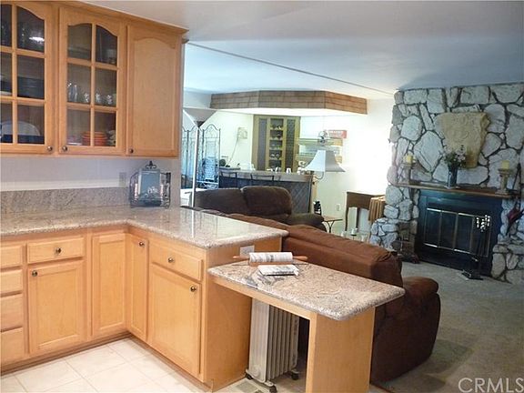 Open kitchen view of family room & wet bar