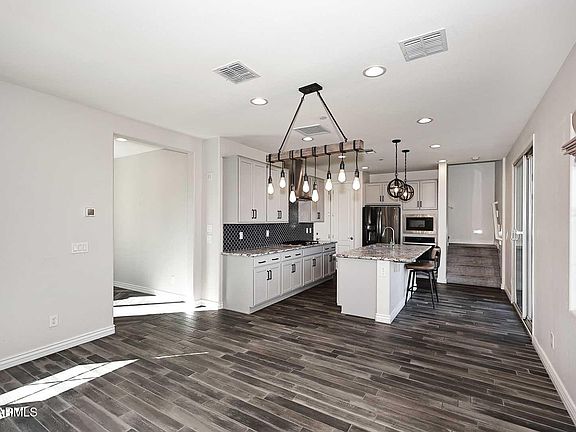 5th image of 7058 E PORTLAND Street