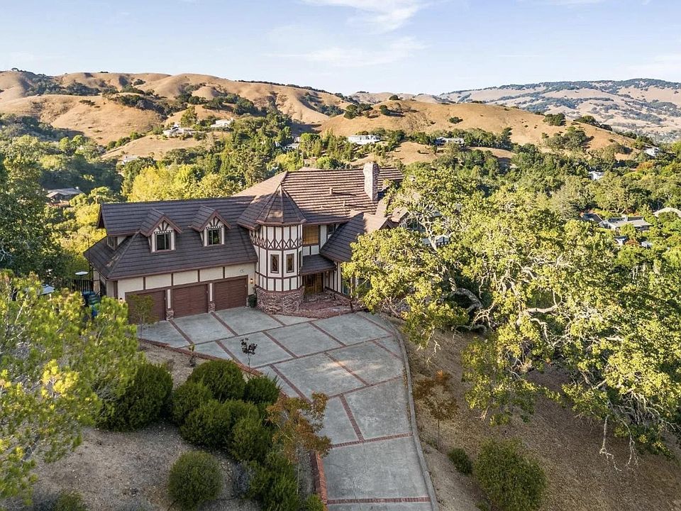 Beautiful Tudor home with amazing, vast views throughout.