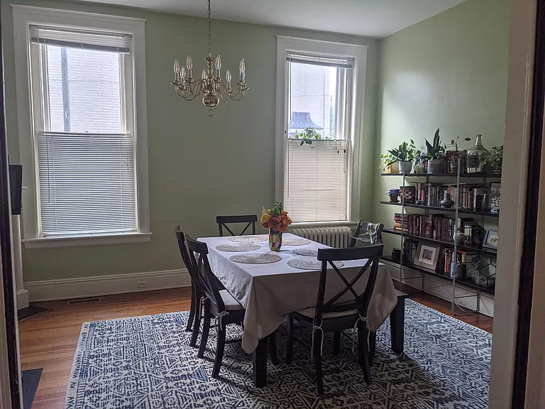 Large dining room with bright afternoon light.