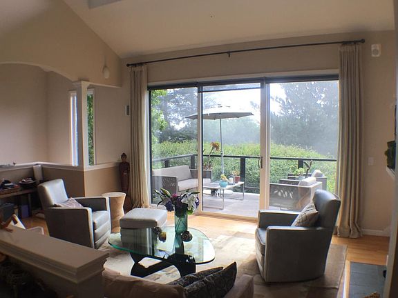 The living room and the east deck.