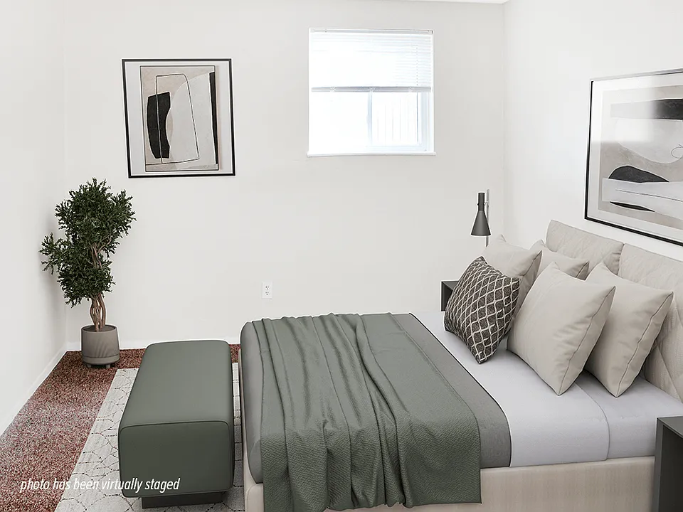 Carpeted Bedroom with Natural Light