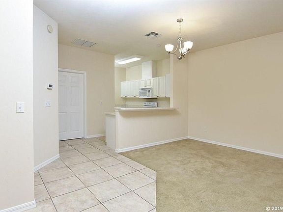 As you enter, you look through to the spacious kitchen.