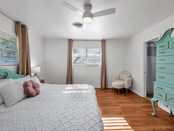 Spacious primary suite with king bed and secure coded entry.