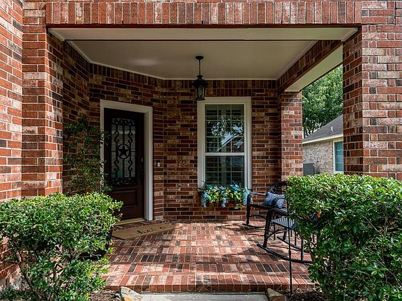 A covered front porch provides a spot to sit and enjoy your morning coffee while waving to the neighbors as they pass by.