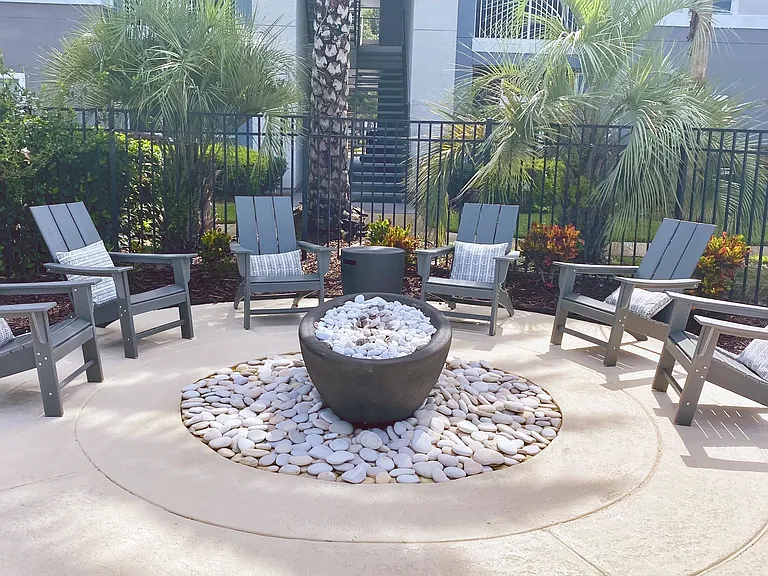 Enjoy a cozy evening around our stylish firepit. Featuring comfortable seating and a serene atmosphere, it's the perfect spot for relaxation and socializing with friends and neighbors.