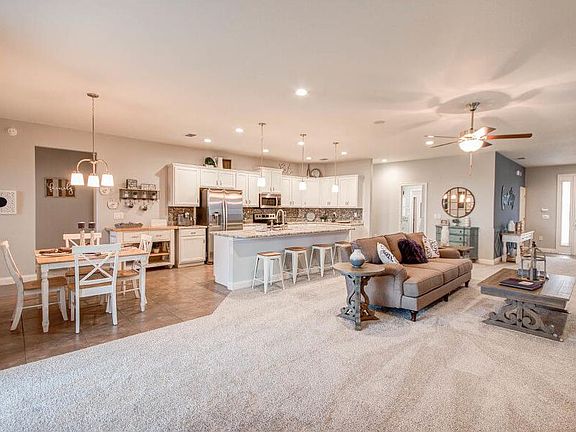 Open and inviting living area - Waylyn - Florida new home by Highland Homes