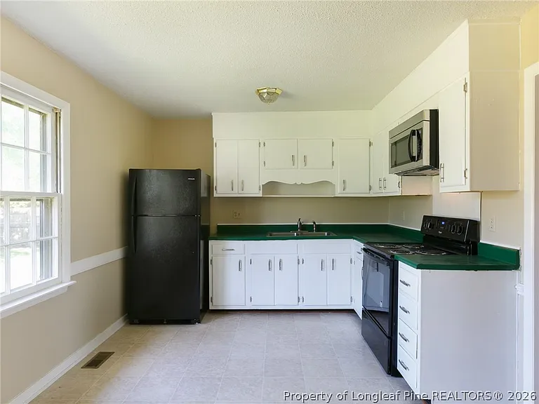 3249 Glenmore Dr — Photo 6