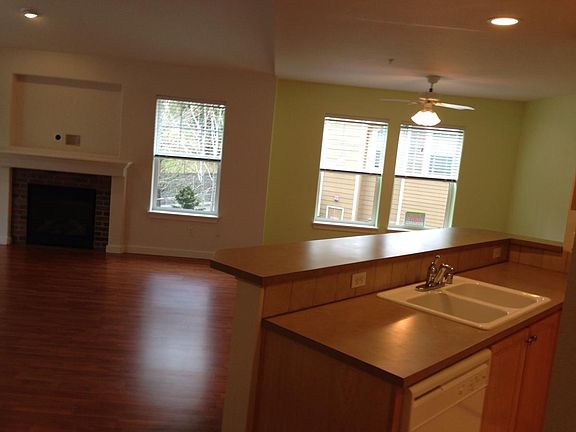 Breakfast bar adjoins the living room and dining area