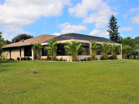 BACKYARD/HUGE LANAI AND POOL AREA
