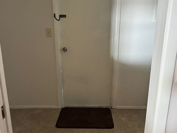 Laundry Room + Door to Enclosed Garage