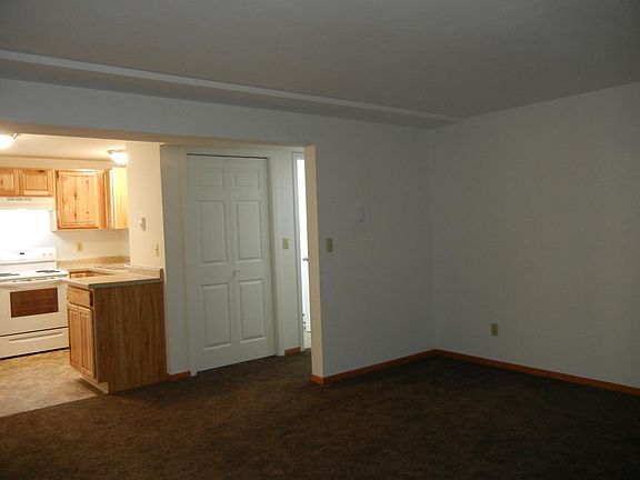 LR looking to Kitchen, Coat Closet, Hallway