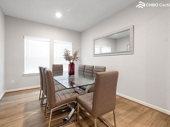 Elegant formal dining room with seating for eight.